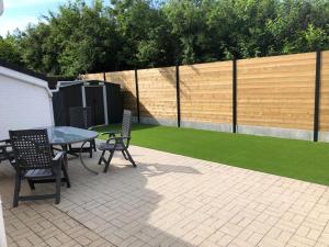 Jardin de l'établissement vakantiehuis nieuwendamme