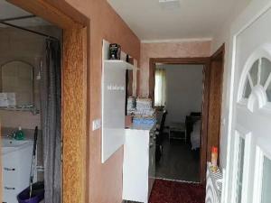 Una cocina o cocineta en Apartman Popadić