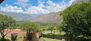 a view of a valley with mountains in the background at Santa Teresita in Cafayate