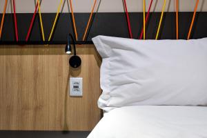 Voodi või voodid majutusasutuse ibis Styles Porto Alegre Moinhos de Vento toas