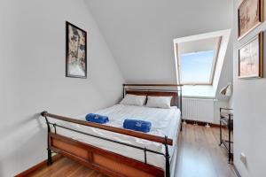 Posteľ alebo postele v izbe v ubytovaní Apartament Penthouse Q4Apartments