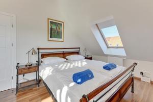 Posteľ alebo postele v izbe v ubytovaní Apartament Penthouse Q4Apartments