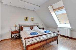 Posteľ alebo postele v izbe v ubytovaní Apartament Penthouse Q4Apartments