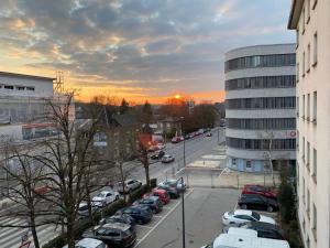 a view of a parking lot with cars parked at studio CHEZ TONY in Luxembourg