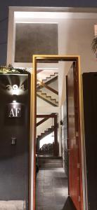 an entrance to a building with a glass door at Ana Frank Boutique Hotel in Lima +63 photos