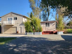 a house with a large driveway in front of it at Sonoma Wine Country Bungalow in Sonoma