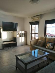 a living room with a couch and a coffee table at Morro Mar in Morro del Jable