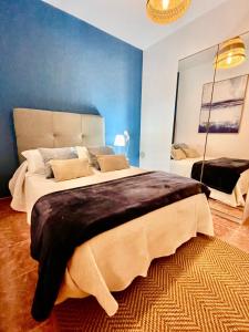 Luxury House Villa de Teguise tesisinde bir odada yatak veya yataklar