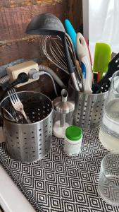 a bunch of utensils in baskets on a counter at Аэропорт in Irkutsk