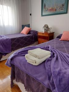 Voodi või voodid majutusasutuse A&B Temporarios Boedo toas