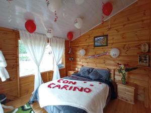 Postel nebo postele na pokoji v ubytování Cabaña La Granja tomine
