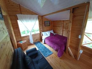 Postel nebo postele na pokoji v ubytování Cabaña La Granja tomine