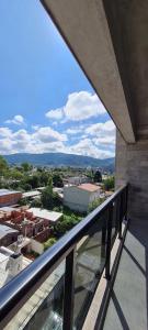 a balcony with a view of a city at DEPARTAMENTO AZ SUITE in Salta