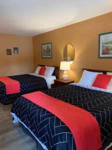 Postel nebo postele na pokoji v ubytování Motel Bavaria