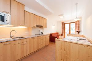 Kuchyň nebo kuchyňský kout v ubytování Residence Pichlerhof