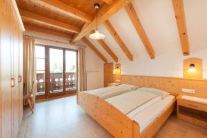 Postel nebo postele na pokoji v ubytování Residence Pichlerhof