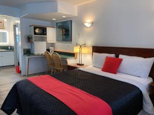 Kuchyň nebo kuchyňský kout v ubytování Motel Bavaria