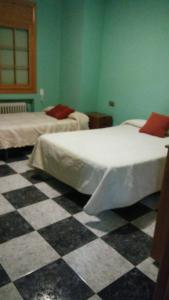 เตียงในห้องที่ Private villa en baza