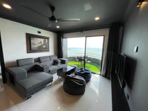 Гостиная зона в The Arena Tanjung Tuan Port Dickson