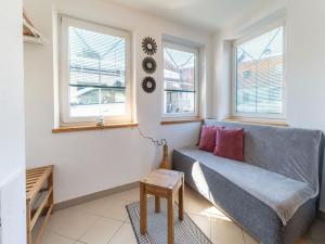 A seating area at Beautiful two-room apartment in Hollersbach
