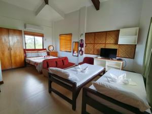 Postel nebo postele na pokoji v ubytování Nickles Park Resort + 37 fotografií