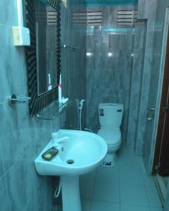 Ванная комната в Oasis Relax Villa