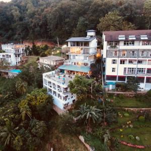 an aerial view of a city with buildings at Blinkbonnie Inn in Kandy