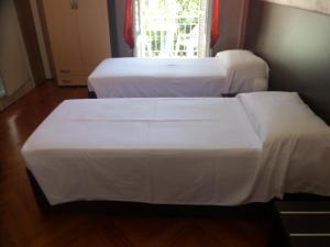 Postel nebo postele na pokoji v ubytování Hotel Liberty