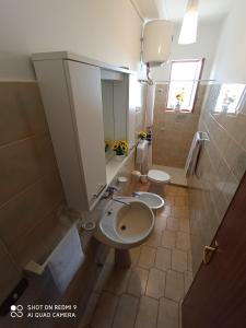 Koupelna v ubytování Mamalina Residence + 37 fotografií