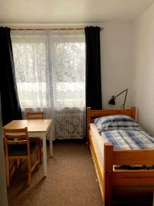Ένα ή περισσότερα κρεβάτια σε δωμάτιο στο Mini Apartment