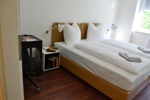 Ein Bett oder Betten in einem Zimmer der Unterkunft Ferienwohnung Rockside