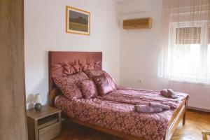 Posteľ alebo postele v izbe v ubytovaní Zserbó Apartman- Poroszló + 17 fotografií