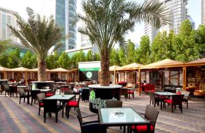 A restaurant or other place to eat at voco - Bonnington Dubai, an IHG Hotel