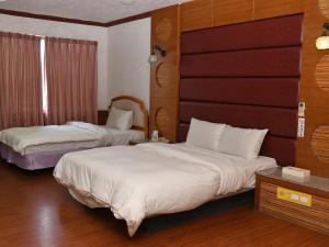 Postel nebo postele na pokoji v ubytování Love Boat Motel + 24 fotografií