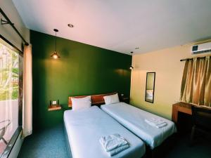 Postel nebo postele na pokoji v ubytování ViVi Hotel Resort