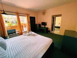 Postel nebo postele na pokoji v ubytování ViVi Hotel Resort