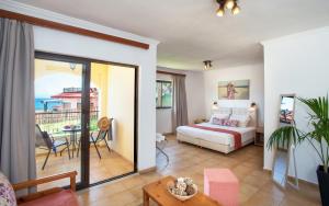 Postel nebo postele na pokoji v ubytování CORFU PELAGOS HOTEL + 27 fotografií