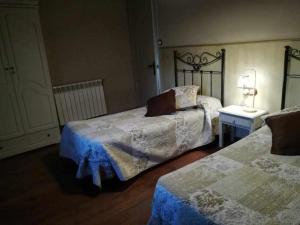 Casa Espunyes Classic房間的床