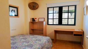 Posteľ alebo postele v izbe v ubytovaní VACAY Dúplex Gala, jardín, aire libre, sol, en la Costa Brava, L'Escala! + 32 fotografií