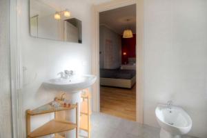 A bed or beds in a room at Sweet Home Faleria