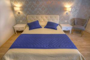 A bed or beds in a room at Sweet Home Faleria