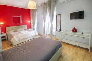 A bed or beds in a room at Sweet Home Faleria