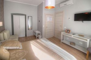 A television and/or entertainment centre at Sweet Home Faleria
