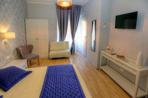 A television and/or entertainment centre at Sweet Home Faleria