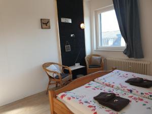 Postel nebo postele na pokoji v ubytování Eifelblümchen