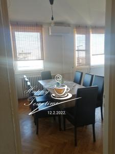 Зона вітальні в Apartman KIKA