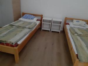 Posteľ alebo postele v izbe v ubytovaní Erdei Pihenőház Terecseny