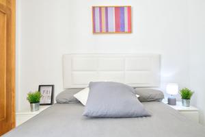 A bed or beds in a room at MalagadeVacaciones - Muriel