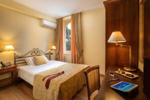 Katil atau katil-katil dalam bilik di Residence Verdeborgo
