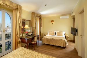 Katil atau katil-katil dalam bilik di Residence Verdeborgo